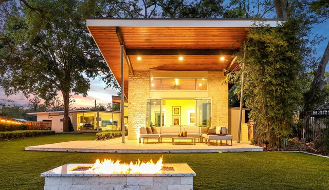 Hip RetroModern Lakefront Cabana with EV Charging Station