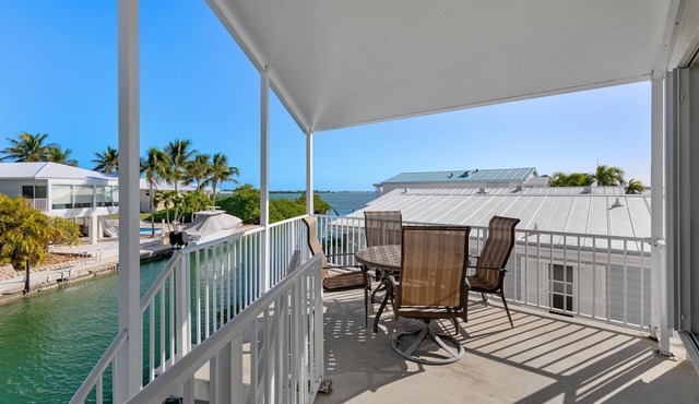 Latitude Adjustment #598, Canal front-Ocean Views