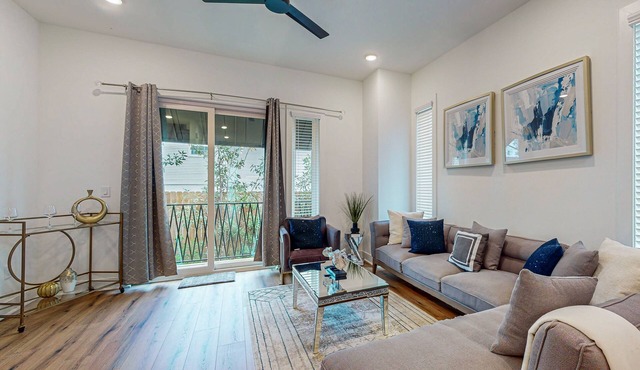 Luxury townhome with open-concept living space & gas fireplace