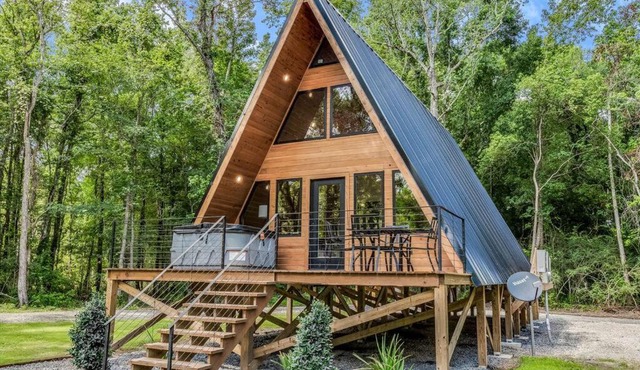 Modern A-Frame Cabin by Rip Van Winkle with Hot Tub