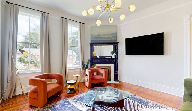 Modern & luxe home in a great location with wood fireplace & original finishes
