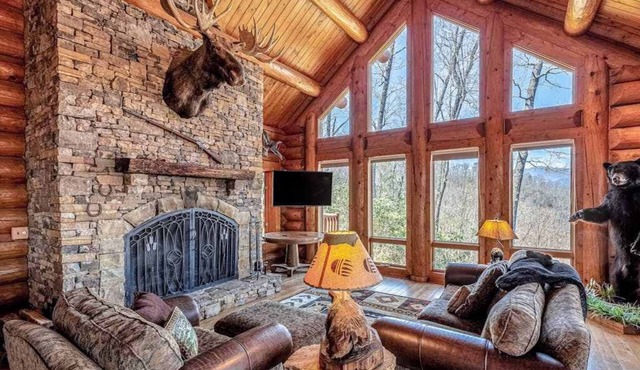 Mountain-view log home with hot tub, firepits, pool table & air hockey