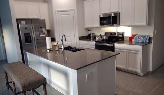 New House 25 Minutes from Disney World with King size bed and Community Pool.