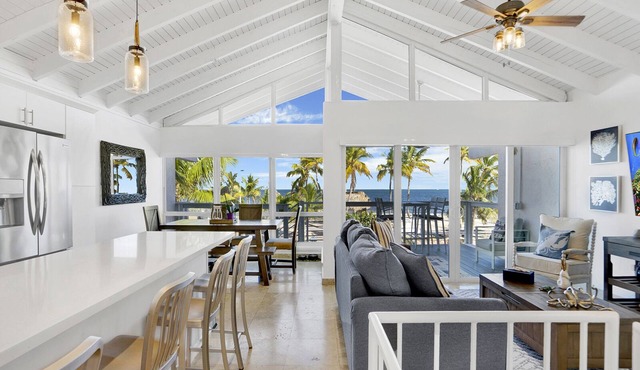 Ocean Front Villa with endless Views, golf cart, paddle boards, kayak and bikes