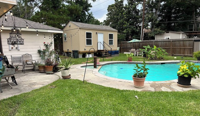 Private tiny home oasis with pool access.
