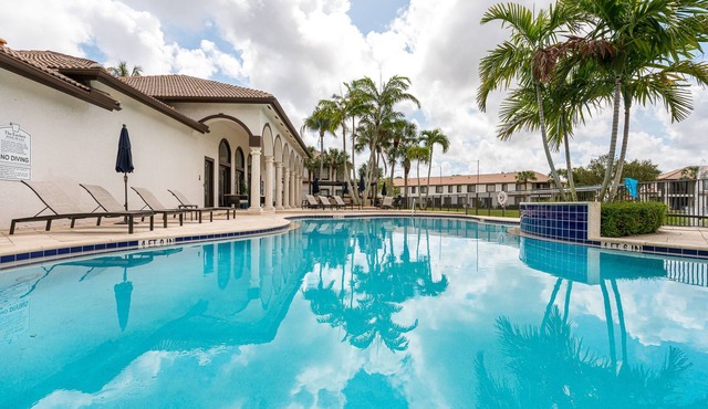 Remodeled Townhome with Pool & Lake Views in Gated Community