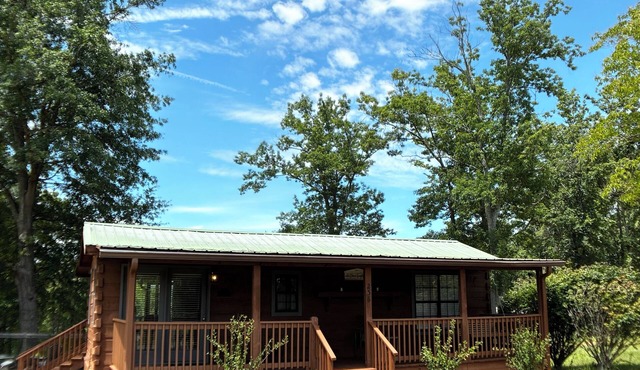 Rustic Refuge: Simple Comfort tucked into the Landrum Foothills- Small Log Cabin