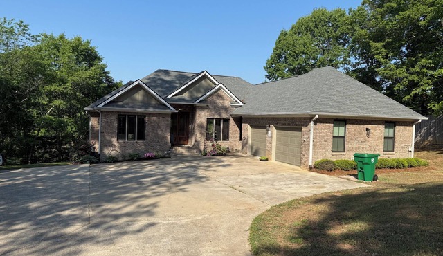 Smith Lake 5 bedroom modernized home with 2 slip boat dock.
