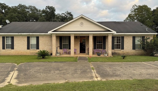 Spacious 4-bedroom house in peaceful Satsuma with AC and land for RV’s etc.