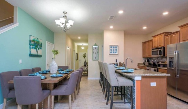 Spacious 5B/4B Storey Lake townhome with private screened pool, resort amenities, sleeps 12. Minutes from Disney & Epic Universe.