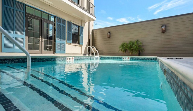 St Charles Ave Condo | Streetcars, Parking, Pool!