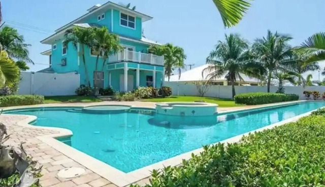 Stunning 4/3 w/Heated Pool, Water View & Arcade!