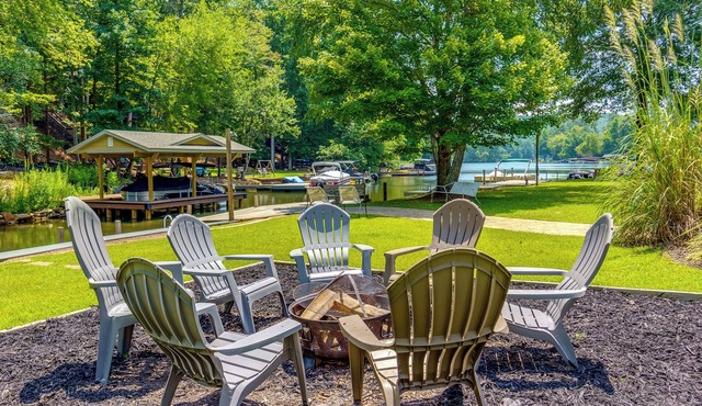 Stylish Lake Front Home on Flat lot w/ Private Dock!