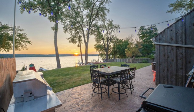Unique riverfront home w/beach, dock, watersports, firepit, hot tub, and sauna!