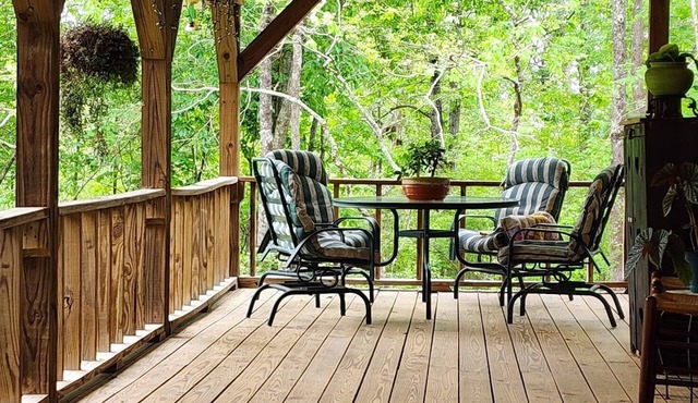 Watch the birds on a wrap-around porch. Very private and pet friendly.