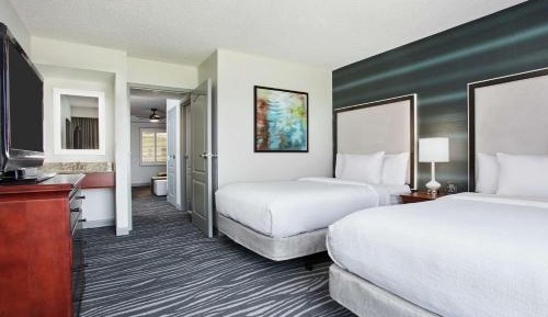 One-Bedroom Suite with Two Double Beds and One Sofa Bed